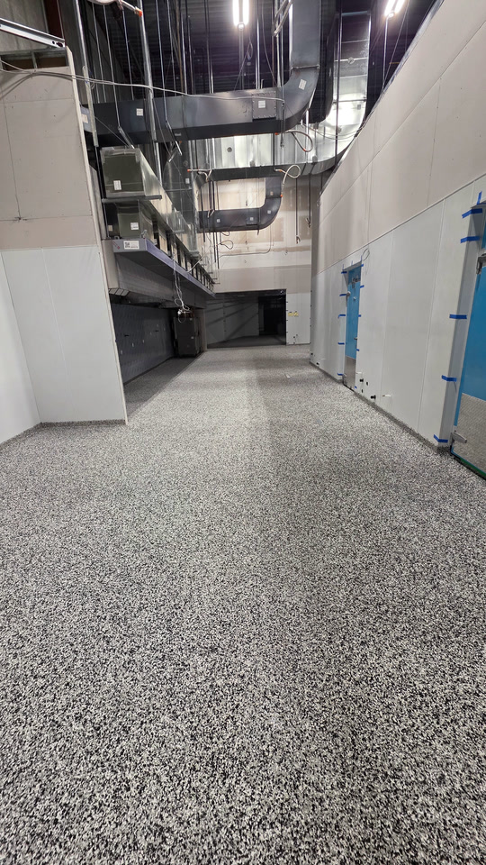 After — seamless flake, drains integrated — Commercial kitchen · Victoria · Decorative flake