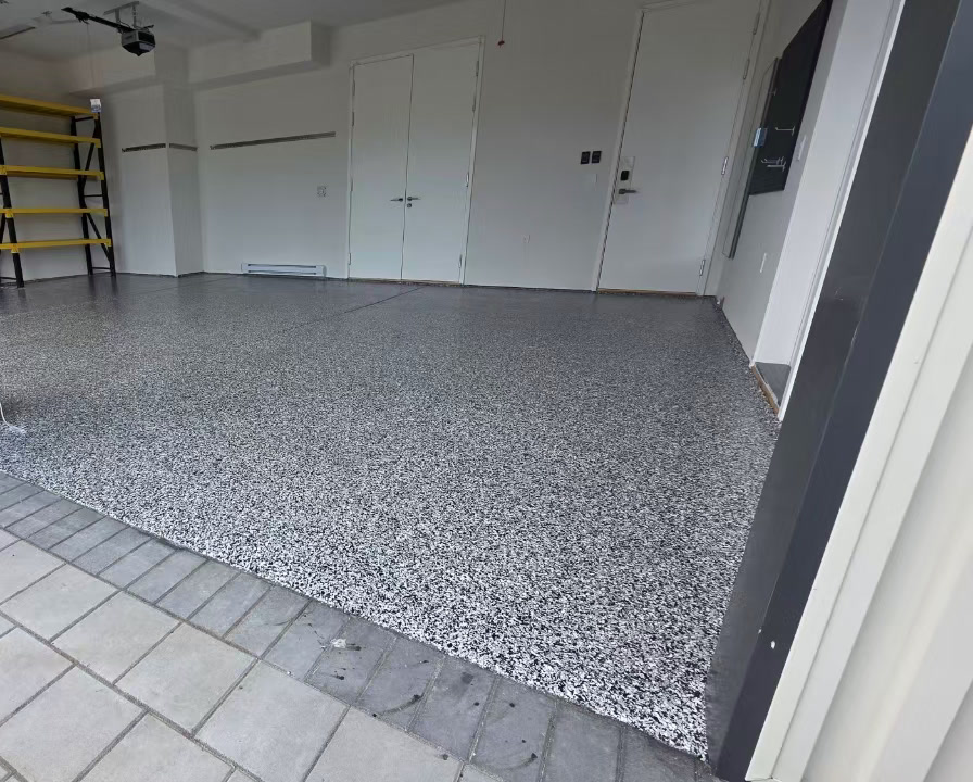 Multi-car residential garage — decorative flake epoxy with clear polyaspartic topcoat