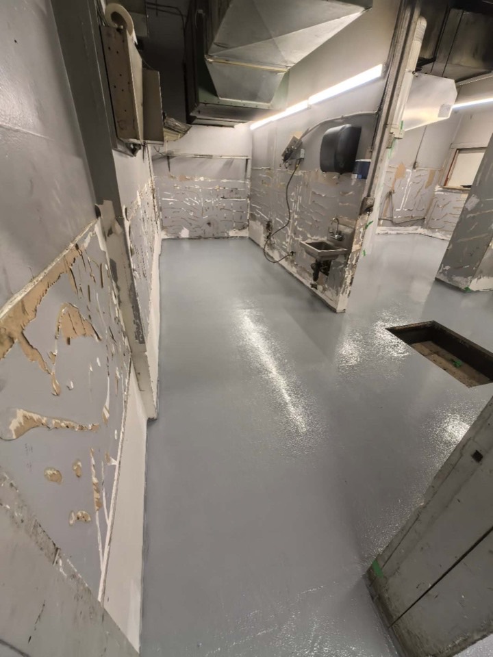 After — textured epoxy — Restaurant kitchen · Vancouver · Sand-broadcast epoxy