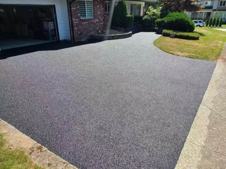 After — poured-in-place rubber over the old driveway — Driveway · BC · Rubber paving