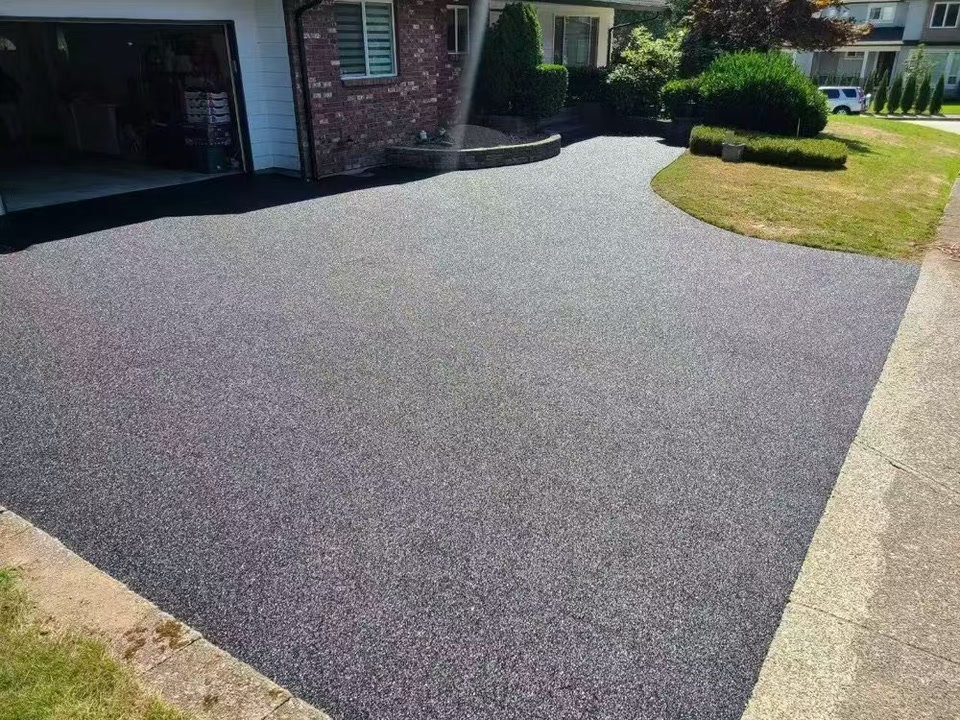 After — poured-in-place rubber over the old driveway — Driveway · BC · Rubber paving
