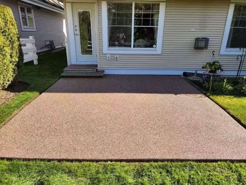 Poured-in-place rubber paving over a concrete patio